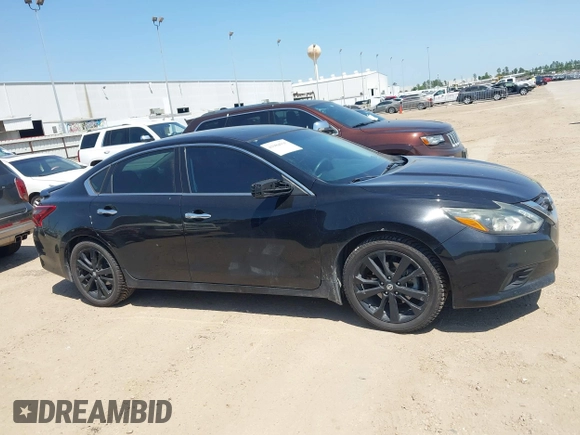 2017 Nissan Altima SR z VIN 1N4AL3AP7HC285742, wystawiony jako IAAI lot #41984935 z przebiegiem 92 855 mil mil oraz . Historia ofert i sprzedaży dostępna na DreamBid. Obrazek 13.