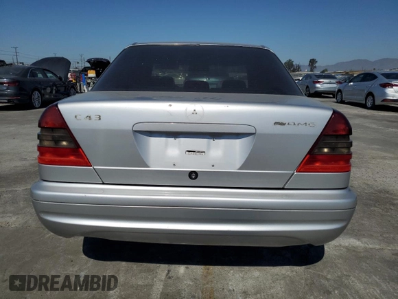 1999 Mercedes-Benz C z VIN WDBHA33G6XF789237, wystawiony jako Copart lot #74065544 z przebiegiem 198 201 mil mil oraz Szkoda całkowita • Salvage title. Historia ofert i sprzedaży dostępna na DreamBid. Obrazek 6.