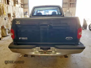 1998 Ford F-150 XL with VIN 1FTZX0725WKB83760, listed as a Copart auction lot 60988225 with 243,361 mi miles and Salvage title. Bid and sale history available at DreamBid. Image 6.