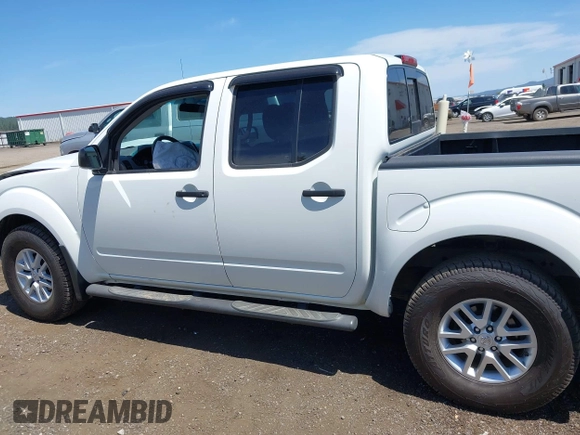 2017 Nissan Frontier Pro-4X with VIN 1N6AD0EV1HN756073, listed as a IAAI auction lot 42703206 with 96,557 mi miles and . Bid and sale history available at DreamBid. Image 14.