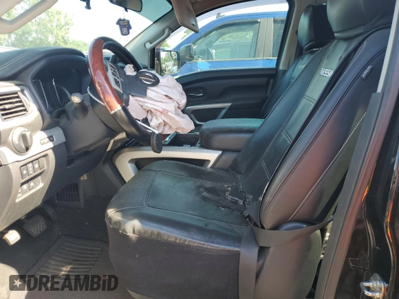 2017 Nissan Titan Platinum Reserve with VIN 1N6AA1E53HN569660, listed as a Copart auction lot 54409625 with 98,858 mi miles and Salvage title. Bid and sale history available at DreamBid. Image 7.