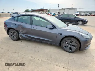 2023 Tesla Model 3 with VIN 5YJ3E1EA1PF468627, listed as a Copart auction lot 57285575 with 5,952 mi miles and Salvage title. Bid and sale history available at DreamBid. Image 4.