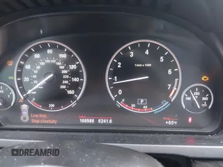 2012 BMW 7 Series 750i with VIN WBAKA8C50CDX01319, listed as a IAAI auction lot 42133359 with 168,986 mi miles and . Bid and sale history available at DreamBid. Image 7.