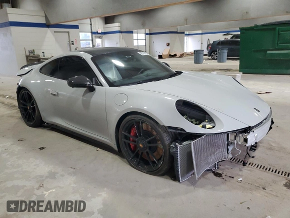 2023 Porsche 911 Carrera S with VIN WP0AB2A92PS220410, listed as a Copart auction lot 85706084 with 14,460 mi miles and Salvage Title. Bid and sale history available at carsss.com. Image 4.