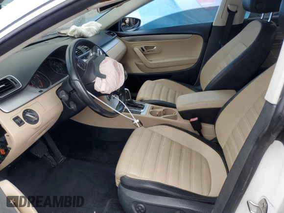 2014 Volkswagen CC Sport with VIN WVWBN7AN3EE528302, listed as a Copart auction lot 69636034 with 77,332 mi miles and Salvage Title. Bid and sale history available at DreamBid. Image 7.