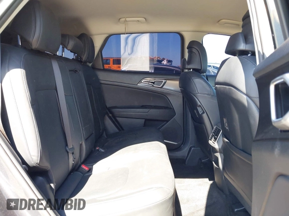 2023 Kia Sportage EX with VIN KNDPVCAG8P7019572, listed as a IAAI auction lot 42226335 with 68,583 mi miles and . Bid and sale history available at DreamBid. Image 8.