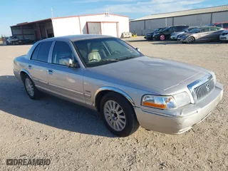 2011 Mercury Grand Marquis LS with VIN 2MEBM7FVXBX605591, listed as a IAAI auction lot 41714845 with 200,623 mi miles. Bid and sale history available at carsss.com. Image 1.