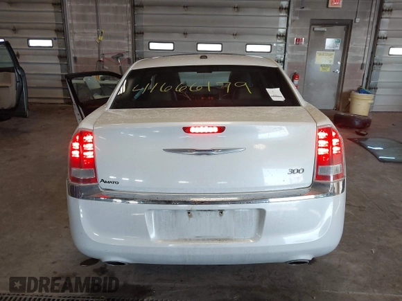 2014 Chrysler 300 with VIN 2C3CCAAGXEH217715, listed as a IAAI auction lot 41666179 with 145,744 mi miles and . Bid and sale history available at DreamBid. Image 16.