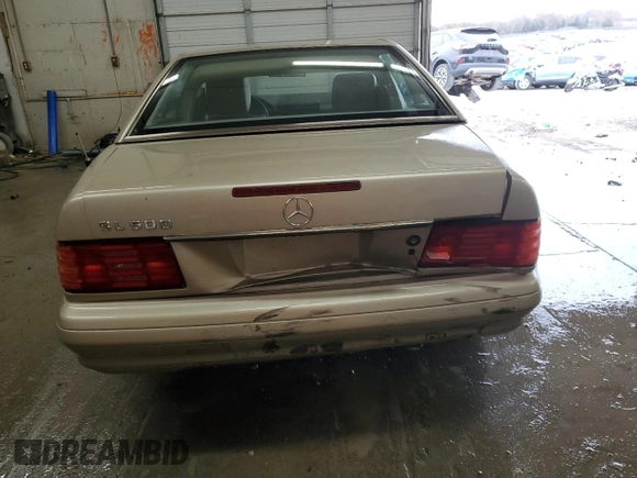 1997 Mercedes-Benz SL 500 with VIN WDBFA67F5VF147986, listed as a Copart auction lot 84255574 with 158,607 mi miles and Salvage title. Bid and sale history available at DreamBid. Image 6.