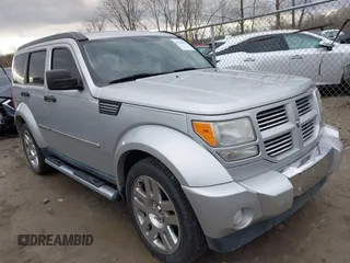 2011 Dodge Nitro Heat with VIN 1D4PU4GK6BW607590, listed as a IAAI auction lot 41810823 with 87,179 mi miles. Bid and sale history available at carsss.com. Image 1.