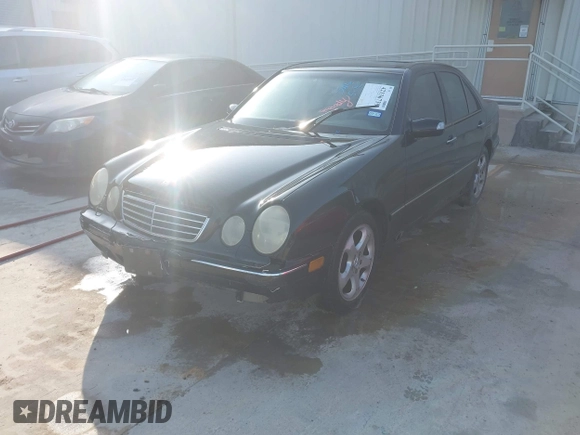 2002 Mercedes-Benz E 320 with VIN WDBJF70J02B477523, listed as a IAAI auction lot 42136739 with 251,354 mi miles and . Bid and sale history available at DreamBid. Image 2.