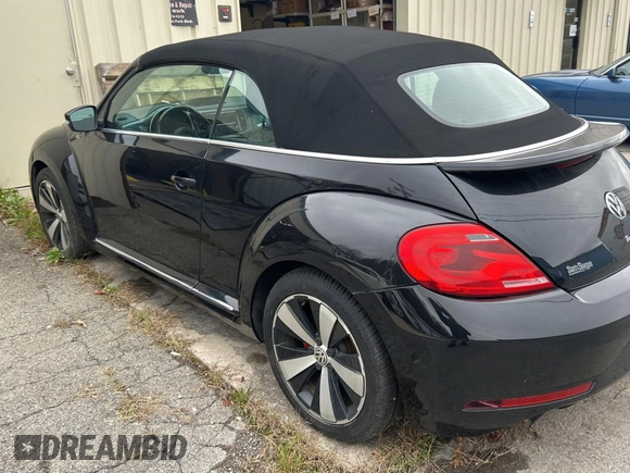 2014 Volkswagen Beetle with VIN 3VW7S7AT3EM800609, listed as a Copart auction lot 81752234 with Not Provided miles and Clean Title. Bid and sale history available at DreamBid. Image 3.