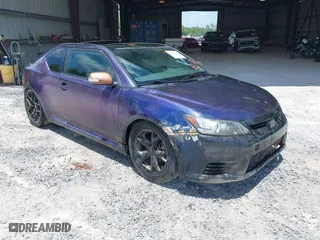 2011 Scion tC with VIN JTKJF5C74B3013322, listed as a IAAI auction lot 41929471 with 214,043 mi miles. Bid and sale history available at carsss.com. Image 1.