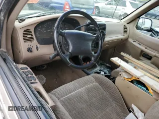 1997 Ford Explorer XLT with VIN 1FMDU35PXVZB69793, listed as a Copart auction lot 70712774 with 138,243 mi miles and Salvage title. Bid and sale history available at DreamBid. Image 8.
