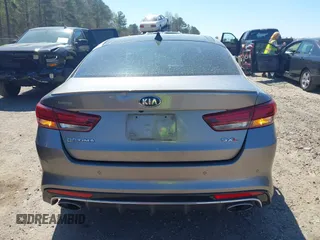2018 Kia Optima SX with VIN 5XXGV4L26JG187281, listed as a IAAI auction lot 41887939 with 124,782 mi miles and . Bid and sale history available at DreamBid. Image 17.