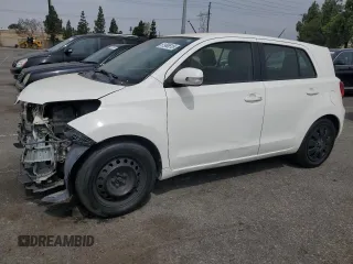 2014 Scion xD with VIN JTKKUPB44E1045331, listed as a Copart auction lot 61968615 with 155,814 mi miles and Salvage title. Bid and sale history available at DreamBid. Image 1.