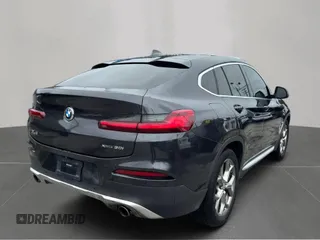 2021 BMW X4 xDrive30i with VIN 5UX2V1C06M9G72451, listed as a Copart auction lot 65089695 with 110,879 mi miles and Clean title. Bid and sale history available at DreamBid. Image 4.