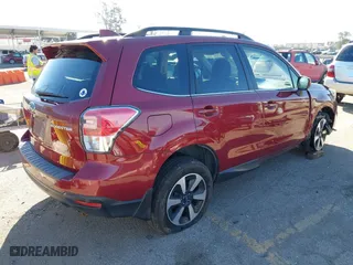2018 Subaru Forester Limited with VIN JF2SJARC7JH521701, listed as a IAAI auction lot 41867767 with 74,118 mi miles. Bid and sale history available at carsss.com. Image 4.