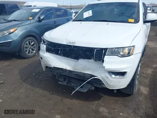 2021 Jeep Grand Cherokee Laredo X with VIN 1C4RJEAG2MC605574, listed as a IAAI auction lot 41642362 with 104,066 mi miles. Bid and sale history available at carsss.com. Image 6.