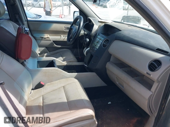 2011 Honda Pilot EX-L with VIN 5FNYF4H56BB037809, listed as a IAAI auction lot 42143553 with 230,873 mi miles. Bid and sale history available at carsss.com. Image 5.