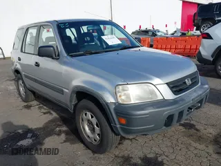 2000 Honda CR-V LX with VIN JHLRD184XYC054038, listed as a IAAI auction lot 41414445 with 294,210 mi miles. Bid and sale history available at carsss.com. Image 1.