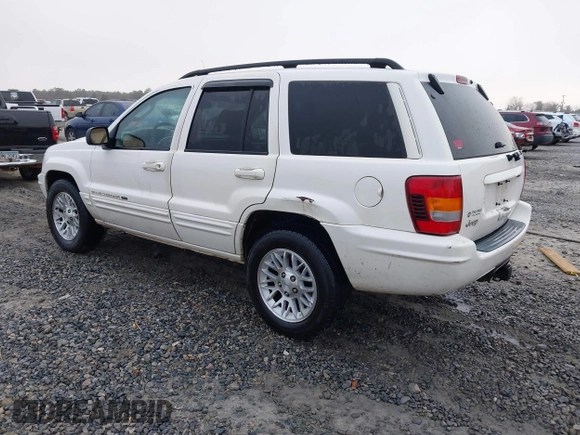 2002 Jeep Grand Cherokee Limited with VIN 1J8GX58N42C283956, listed as a IAAI auction lot 41553997 with 214,388 mi miles and . Bid and sale history available at DreamBid. Image 3.