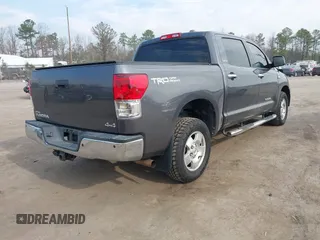 2013 Toyota Tundra Limited z VIN 5TFHY5F19DX301615, wystawiony jako IAAI lot #41837145 z przebiegiem 136 398 mil mil oraz . Historia ofert i sprzedaży dostępna na DreamBid. Obrazek 4.