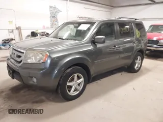 2011 Honda Pilot EX-L with VIN 5FNYF4H55BB039079, listed as a IAAI auction lot 42029278 with 173,216 mi miles. Bid and sale history available at carsss.com. Image 2.