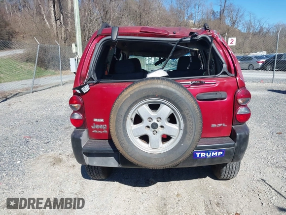 2005 Jeep Liberty Sport with VIN 1J4GL48K35W645419, listed as a IAAI auction lot 41823845 with 168,896 mi miles. Bid and sale history available at carsss.com. Image 16.