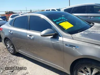 2016 Kia Optima EX with VIN 5XXGU4L31GG106854, listed as a IAAI auction lot 41762052 with 122,121 mi miles. Bid and sale history available at carsss.com. Image 13.