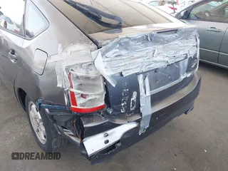 2007 Toyota Prius z VIN JTDKB20UX73281542, wystawiony jako IAAI lot #42449989 z przebiegiem 164 111 mil mil oraz . Historia ofert i sprzedaży dostępna na DreamBid. Obrazek 6.
