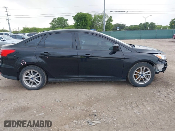 2018 Ford Focus SE with VIN 1FADP3F28JL302634, listed as a IAAI auction lot 42103219 with 71,682 mi miles and . Bid and sale history available at DreamBid. Image 14.