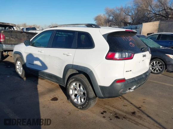 2019 Jeep Cherokee Trailhawk with VIN 1C4PJMBX8KD313712, listed as a IAAI auction lot 41448146 with 96,293 mi miles and . Bid and sale history available at DreamBid. Image 3.