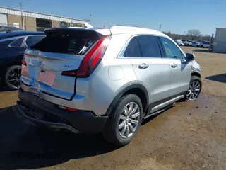 2019 Cadillac XT4 FWD Premium Luxury with VIN 1GYFZCR47KF110481, listed as a IAAI auction lot 41771338 with 103,124 mi miles and . Bid and sale history available at carsss.com. Image 4.