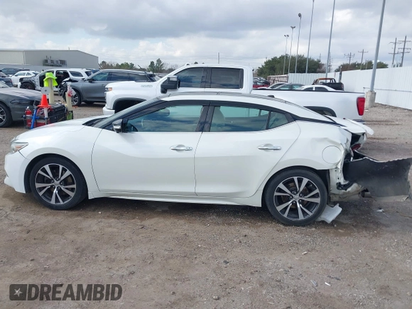 2016 Nissan Maxima SL z VIN 1N4AA6AP8GC403657, wystawiony jako IAAI lot #41506188 z przebiegiem 97 935 mil mil oraz . Historia ofert i sprzedaży dostępna na DreamBid. Obrazek 14.