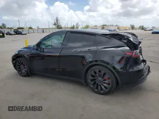2023 Tesla Model Y Performance with VIN 7SAYGDEF8PF762915, listed as a Copart auction lot 50270285 with 23,893 mi miles and Salvage Title. Bid and sale history available at DreamBid. Image 2.