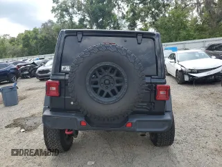 2020 Jeep Wrangler Unlimited Rubicon with VIN 1C4HJXFN2LW218258, listed as a Copart auction lot 55951655 with 64,588 mi miles and Non repairable. Bid and sale history available at DreamBid. Image 6.