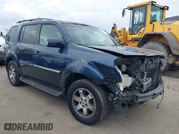 2009 Honda Pilot Touring with VIN 5FNYF48929B040199, listed as a IAAI auction lot 41466006 with 167,959 mi miles and . Bid and sale history available at carsss.com. Image 1.