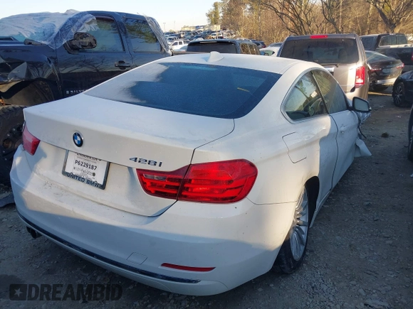 2015 BMW 4 Series 428i z VIN WBA3N3C58FK232881, wystawiony jako IAAI lot #41328639 z przebiegiem 87 770 mil mil oraz . Historia ofert i sprzedaży dostępna na DreamBid. Obrazek 4.