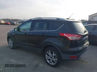 2015 Ford Escape Titanium with VIN 1FMCU0J98FUA19911, listed as a IAAI auction lot 41750596 with 106,706 mi miles. Bid and sale history available at carsss.com. Image 3.