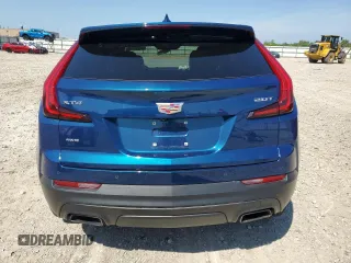2019 Cadillac XT4 AWD Luxury with VIN 1GYFZBR43KF149952, listed as a Copart auction lot 64898985 with 71,513 mi miles and Non repairable. Bid and sale history available at DreamBid. Image 6.