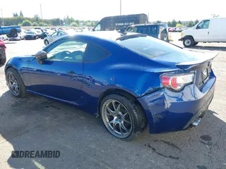 2013 Scion FR-S with VIN JF1ZNAA11D2702415, listed as a IAAI auction lot 40381041 with 63,581 mi miles. Bid and sale history available at carsss.com. Image 6.
