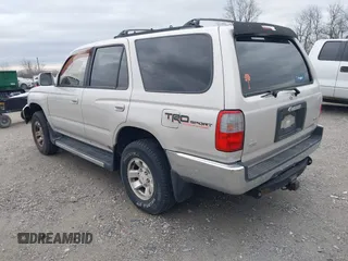 1998 Toyota 4Runner SR5 z VIN JT3GN86RXW0059946, wystawiony jako IAAI lot #41843789 z przebiegiem 293 069 mil mil oraz . Historia ofert i sprzedaży dostępna na DreamBid. Obrazek 3.