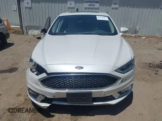 2017 Ford Fusion Titanium z VIN 3FA6P0SU0HR329224, wystawiony jako IAAI lot #42291605 z przebiegiem 176 728 mil mil oraz . Historia ofert i sprzedaży dostępna na DreamBid. Obrazek 13.