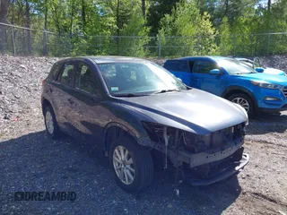 2013 Mazda CX-5 Sport with VIN JM3KE4BE8D0100273, listed as a IAAI auction lot 42297107 with 185,214 mi miles and . Bid and sale history available at DreamBid. Image 1.
