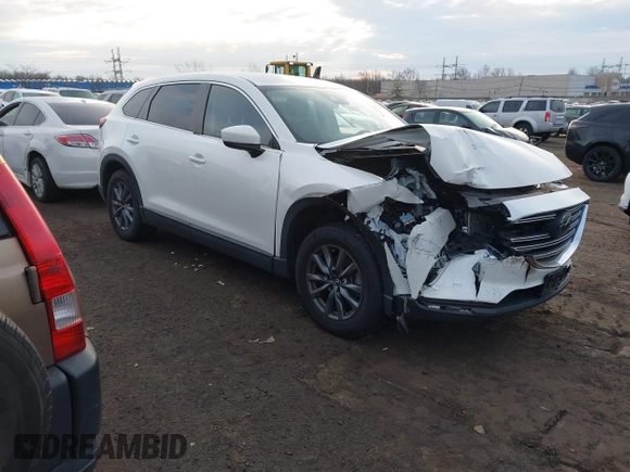 2020 Mazda CX-9 Sport with VIN JM3TCBBY6L0414673, listed as a IAAI auction lot 41310952 with 27,686 mi miles. Bid and sale history available at carsss.com. Image 1.