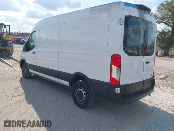 2021 Ford Transit Cargo with VIN 1FTBR1C85MKA19997, listed as a IAAI auction lot 41431285 with 61,158 mi miles and . Bid and sale history available at DreamBid. Image 3.