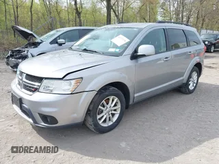 2015 Dodge Journey SXT with VIN 3C4PDDBG4FT554643, listed as a IAAI auction lot 42172378 with 144,924 mi miles and . Bid and sale history available at DreamBid. Image 2.