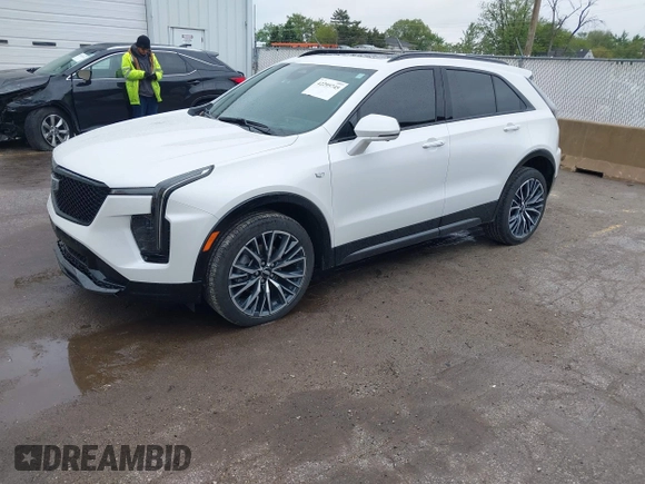 2024 Cadillac XT4 AWD Sport with VIN 1GYFZFR40RF223782, listed as a IAAI auction lot 42295745 with 7,254 mi miles and . Bid and sale history available at DreamBid. Image 18.