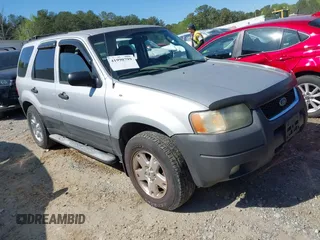 2003 Ford Escape XLT Popular 2 with VIN 1FMYU93183KD62338, listed as a IAAI auction lot 41990799 with 216,952 mi miles and . Bid and sale history available at DreamBid. Image 1.